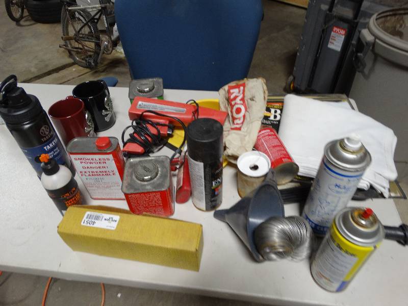 lot 4051 image: Lot of shotgun powder, 2 cups, chemicals, ect.