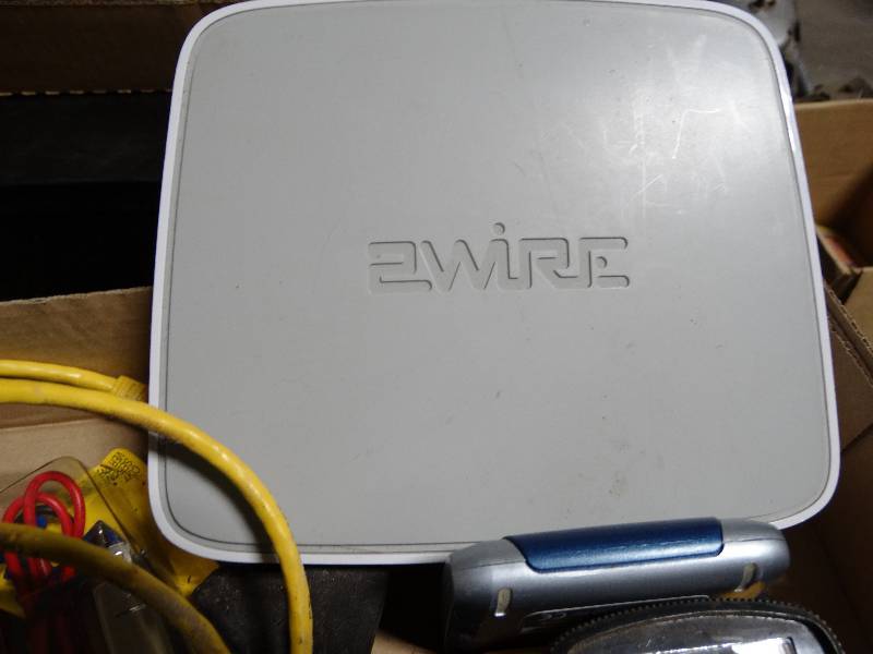 lot 4064 image: Lot of various wires, modem, head light, ect.