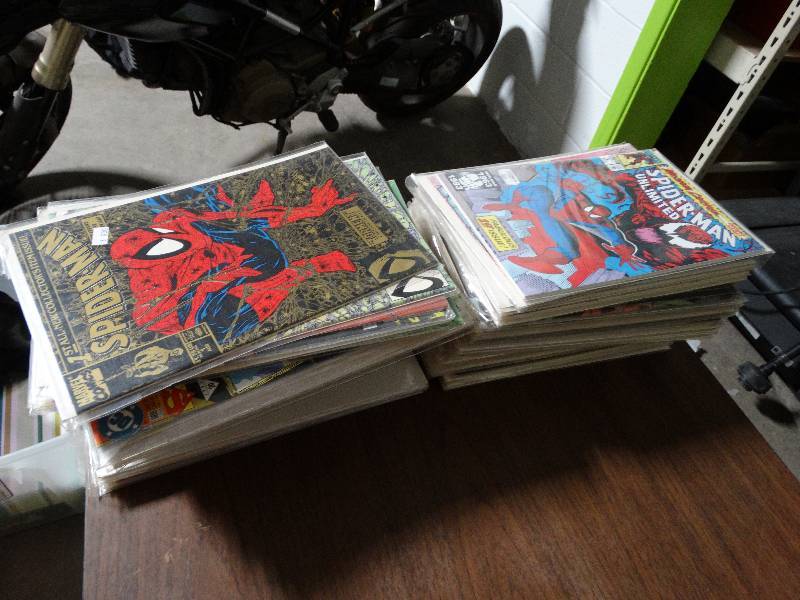 lot 4079 image: Lot of comic books iron man, super man, spawn, & more.