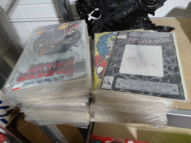 lot 4080 image: Lot of comic books fantastic four, super man, dr, strange, & more.