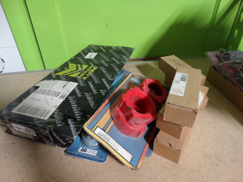 lot 4086 image: Megan racing rear camber kit, knobby bushing, & more parts.