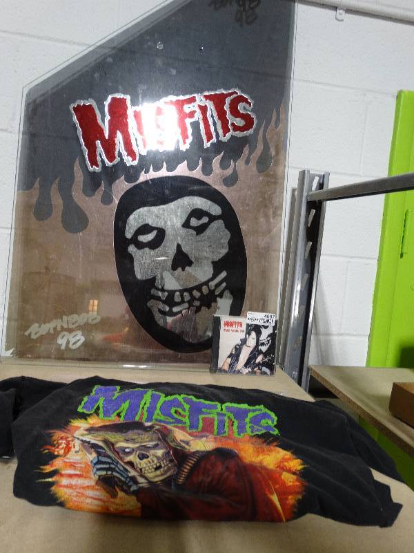 lot 4097 image: Misfits sign, shirt, & CD, & woodstock.