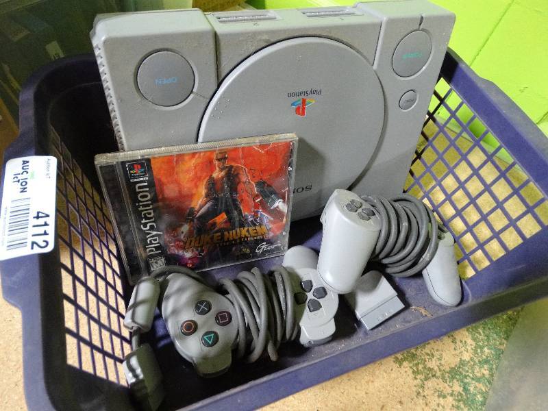 lot 4112 image: Playstation w2 controllers & 1 game.