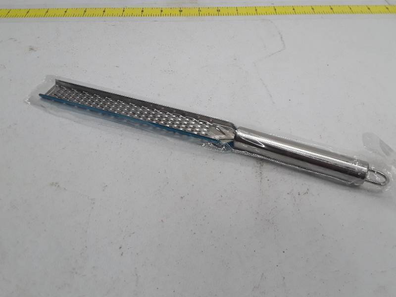 lot 30132 image: Multipurpose Chocolate Cinnamon Cheese Grater - Lemon Zester