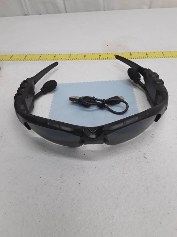 lot 28174 image: UV Proof Sports Glasses with Inner Headphones