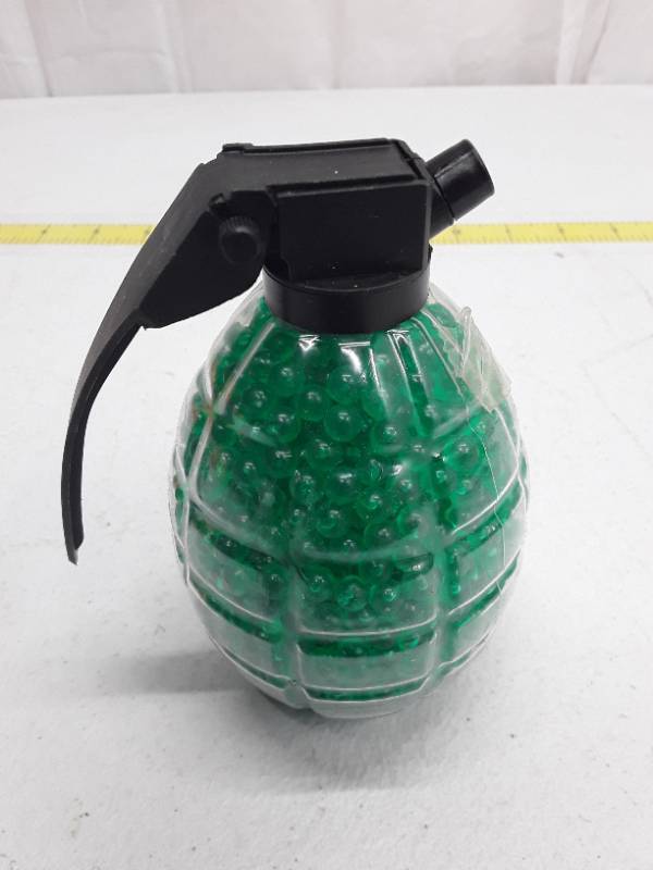 lot 29021 image: 1500 UK Arms .12g Airsoft BBs w Quickload Grenade Container - Green