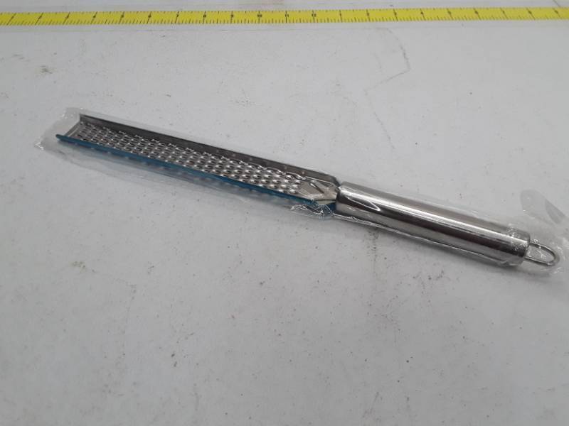 lot 30131 image: Multipurpose Chocolate Cinnamon Cheese Grater - Lemon Zester