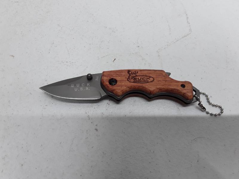 lot 56975 image: Premium Stainless Steel Mini Folding Knife with Solid Wood Handle - Lightweight, Spear Point Blade for Outdoor Camping, Hiking & Everyday Carry - For Men & Women - Perfect Gift for Adventurers & Outdoor Enthusiasts