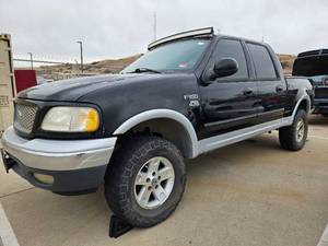 lot 50280 image: 2000 Ford F150, BLACK
