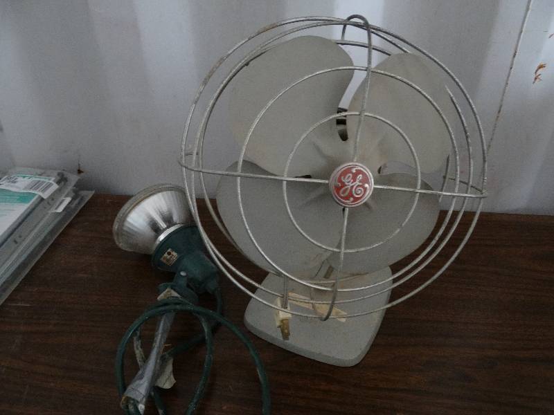 lot 7817 image: Antique Fan & Flood Light Stake
