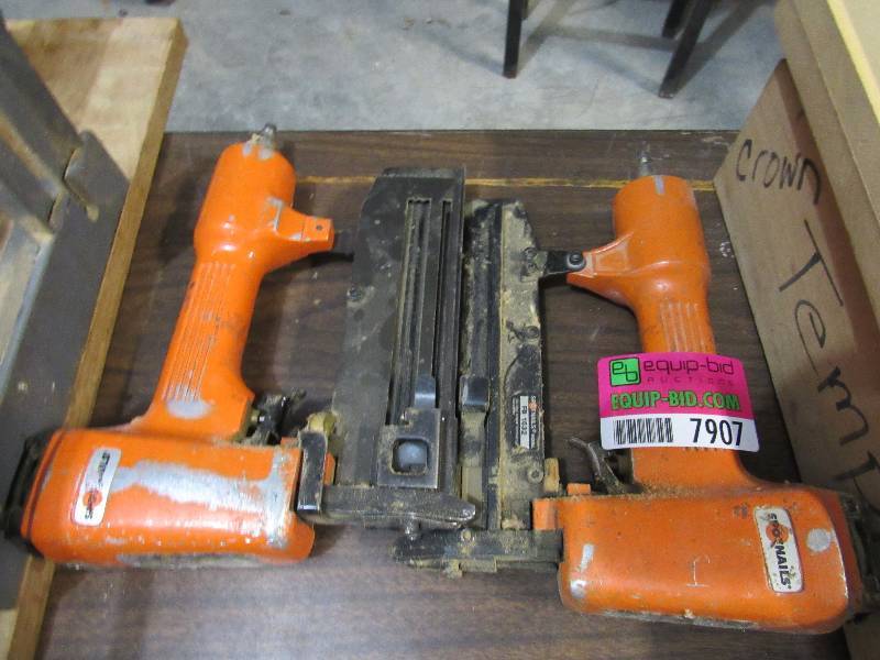 lot 7907 image: Pair of Pneumatic Mailers - Spot Nails