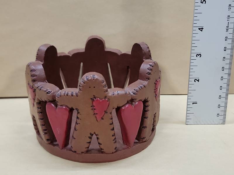 lot 12476 image: Vintage Handcrafted Heart & Figure Tea Light Holder