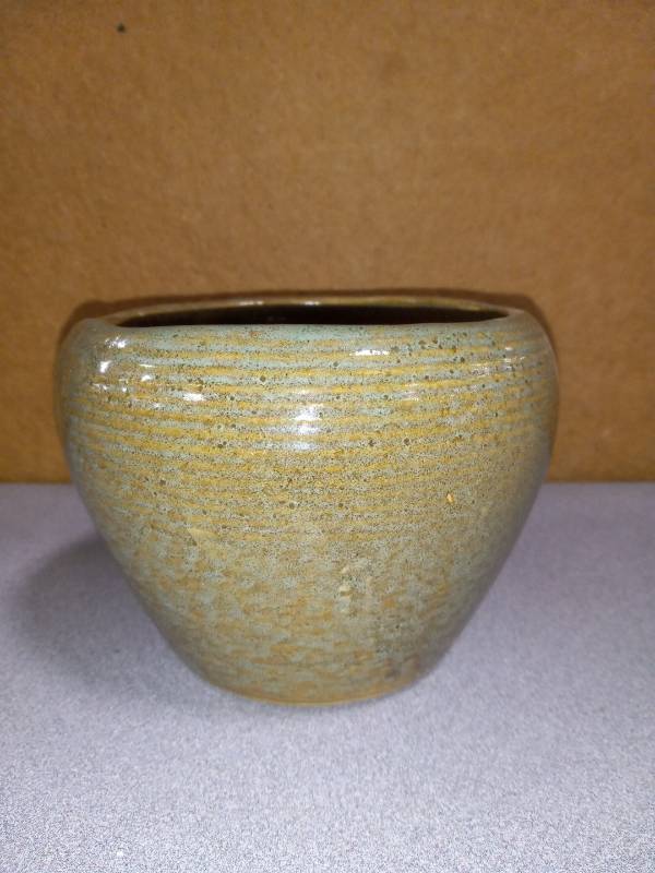 lot 12618 image: Vintage Handcrafted Ceramic Bowl with Striped Texture