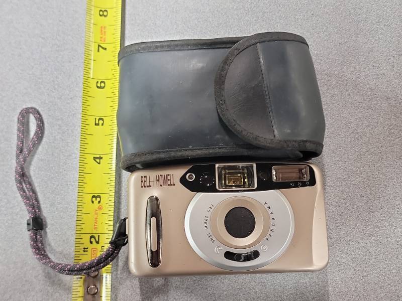 lot 12630 image: Vintage BellHowell Point and Shoot Film Camera with Case
