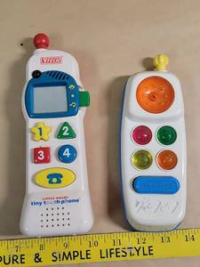 lot 8703 image: Vintage VTech Little Smart Tiny Touch Phone & Fisher-Price Remote Toy Set