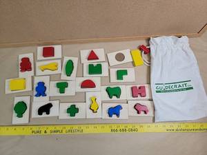 lot 8735 image: Guidecraft Wooden Shape and Animal Puzzle Set