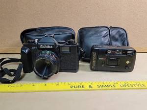 lot 30057 image: Vintage Nishika MF-3 Camera with Polaroid 3000AF Bundle