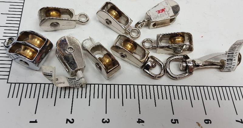 lot 6562 image: All new pieces and from a hardware store supply pulleys and pieces for cable or rope