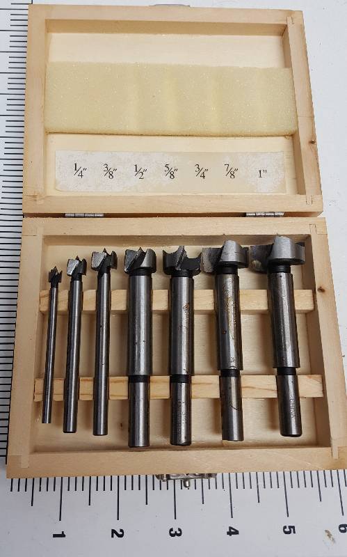 lot 6564 image: New in the storage box is this DrillMaster Forstner bit set.  Nice package here