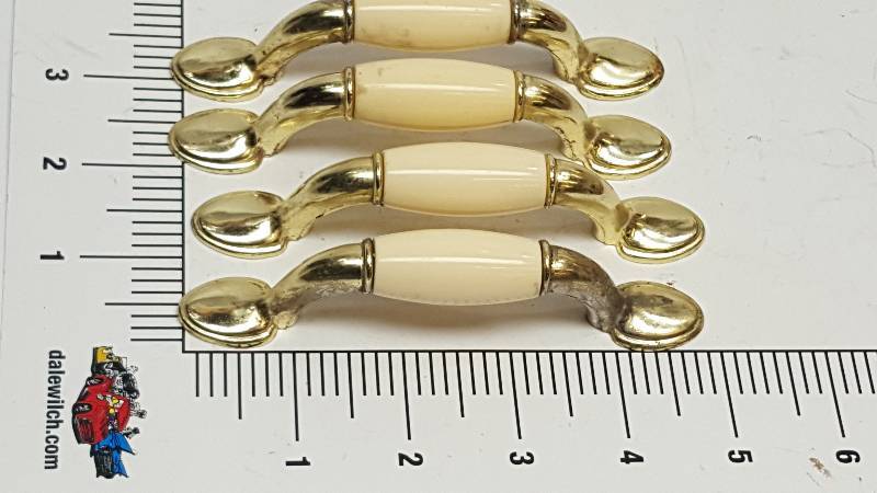 lot 6491 image: Set of 4 Pearl handle and brass plated drawer pulls
