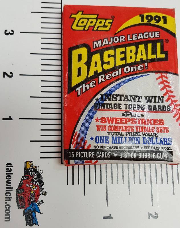 lot 5361 image: New 15 card pack of the 1991 Topps Baseball Cards and bubble gum.