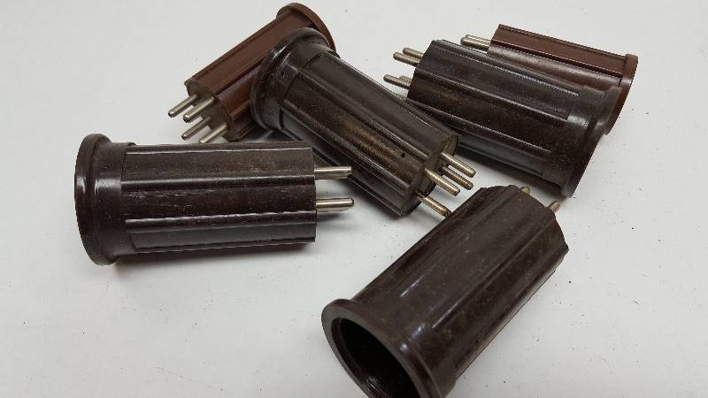 lot 5367 image: Found under the old Tinkerers work bench is this box of electronic pieces.  Look real close, I think I see something you might need later