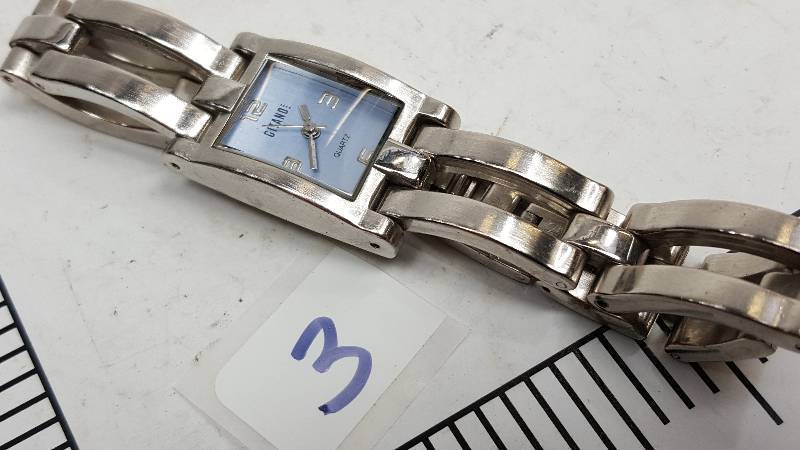 lot 5393-3 image: This watch is from a collection picked up at a Storage Locker Wars auction.  None have been tested