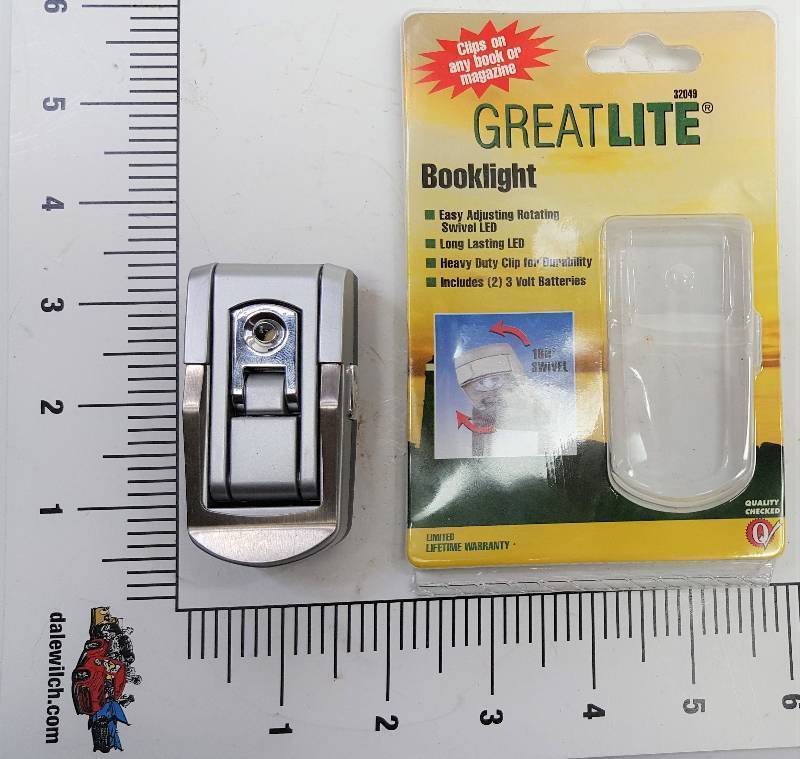 lot 5630 image: New in the package Hokey little sneak under the covers & read your book w the swivel head LED light.