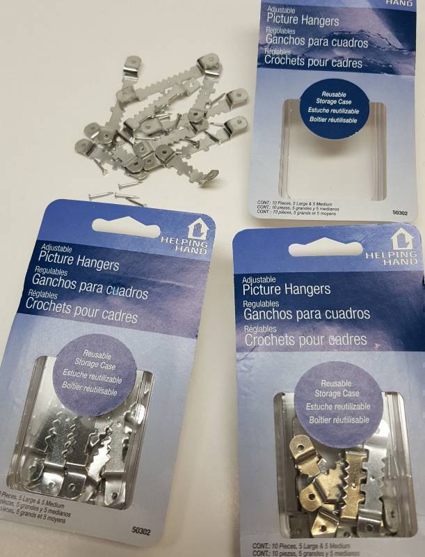 lot 6981-3 image: 3 new packs of 10 adjustable 2 sizes picture hangers with hardware 30 pieces total  If youre a handy man put some of these in your truck