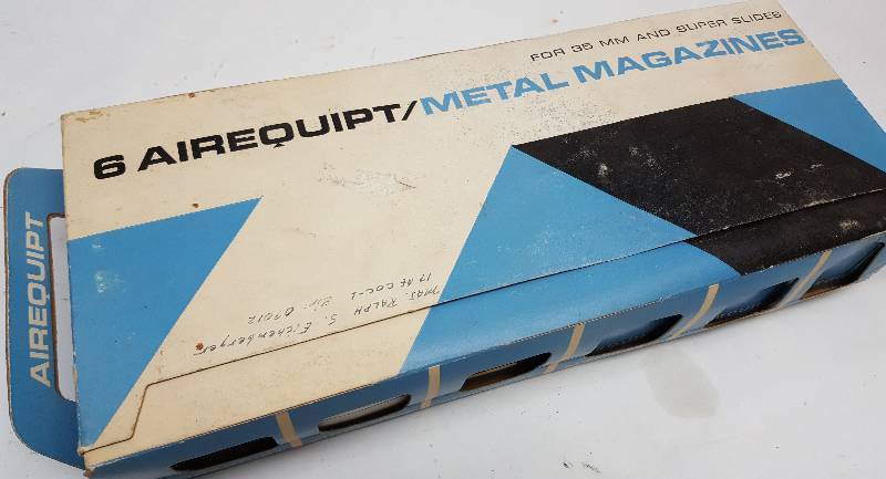 lot 6219 image: Case and all of these 6 Airequipt metal automatic slide magazines look new.