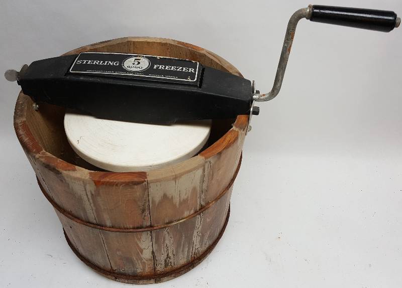 lot 5032 image: Crank it up and enjoy the ice cream this summer with this 5 quart ice cream maker and wooden bucket.