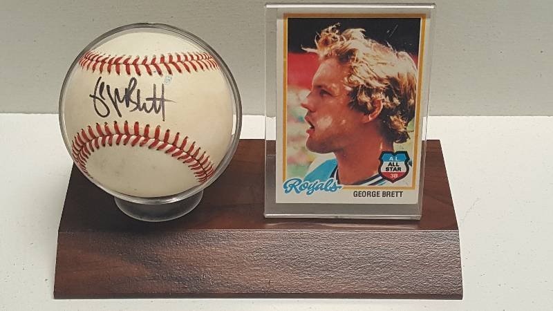 lot 1098 image: George Brett Autographed Rawlings Official American League Baseball Kansas City Royals w Display Case & COA