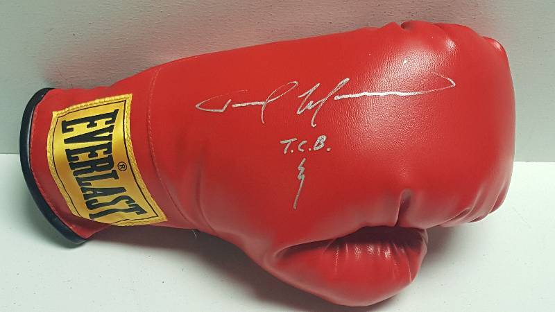 lot 1110 image: Tommy The Duke Morrison Autographed Everlast Boxing Glove w Inscription & COA