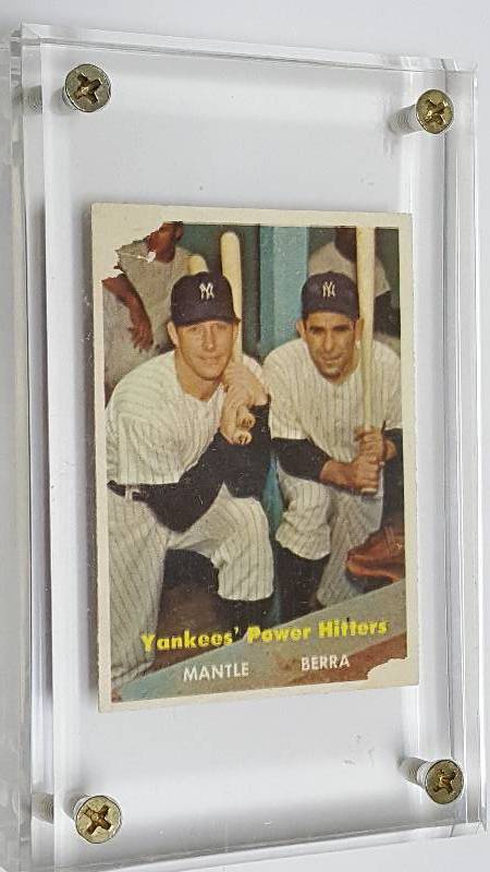 lot 1112 image: 1957 Topps Yankees Power Hitters #407 Mickey Mantle & Yogi Berra Book Value $600
