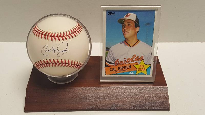 lot 1128 image: Cal Ripken Jr. Autographed Rawlings Official American League Baseball Baltimore Orioles HOF w COA