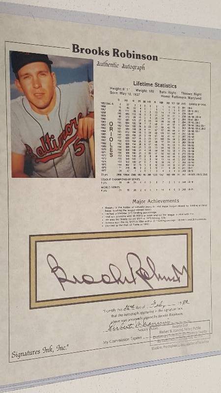 lot 1167 image: Brooks Robinson Autographed HOF Stat Sheet Notarized COA 1990 Baltimore Orioles