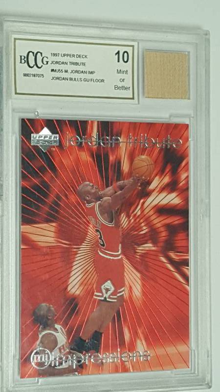 lot 1209 image: Michael Jordan 1997 Upper Deck #55 w Game Used Bulls Floor Relic Graded Beckett BCCG Mint