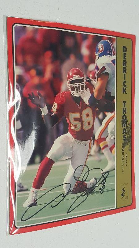 lot 1240 image: Derrick Thomas Autographed Team NFL Bio Oversized Football Card Kansas City Chiefs HOF