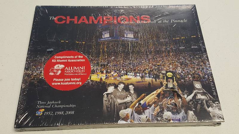 lot 1302 image: The Champions Kansas Basketball at the Pinnacle KU Basketball National Champion Alumni Book New