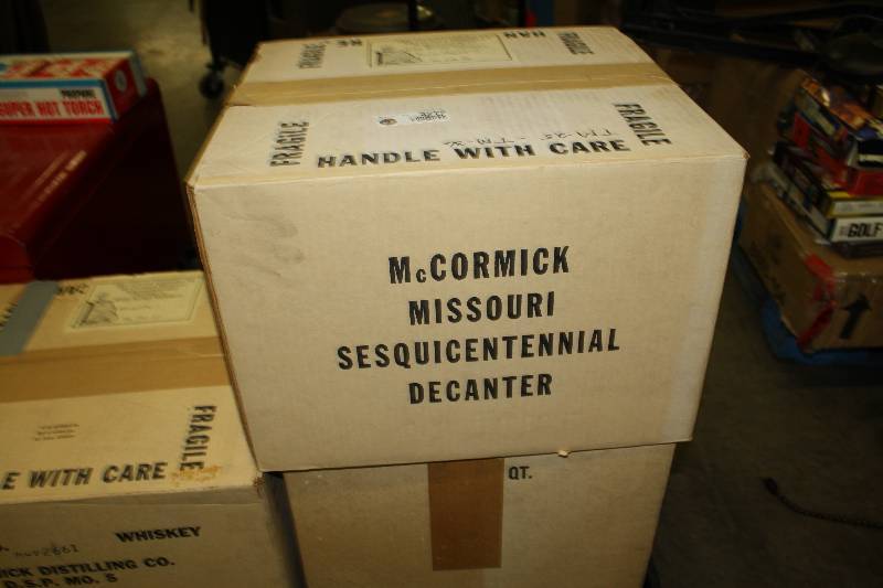 lot 2272 image: Rare - Case of 12 unopened of 50 year old Limited Edition Missouri Sesquicentennial Commemorative McCormick Decanter