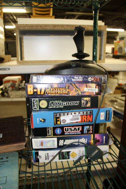 lot 2225 image: Vintage Video Games and Controller