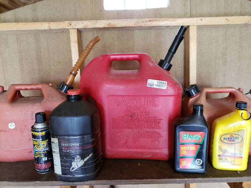 lot 10694 image: Lot of Gas Cans and more