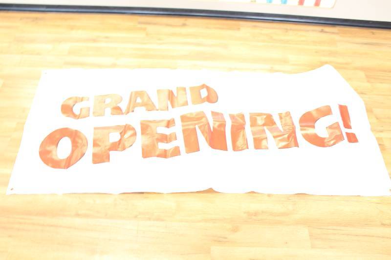 lot 2000 image: Grand Opening Sign