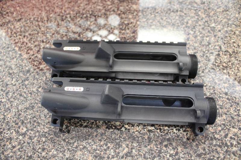 lot 2006 image: 2 stripped AR 15 uppers