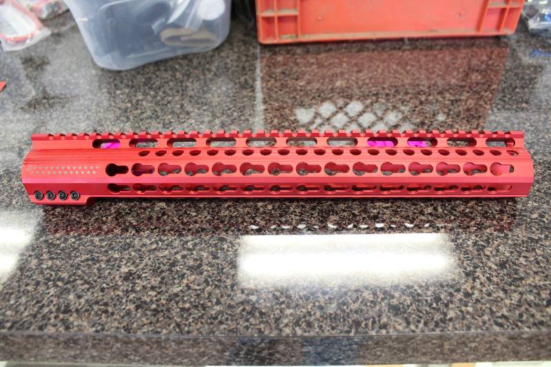 lot 2008 image: 15 Red anodized AR 15 Free Floating Keymod Rail