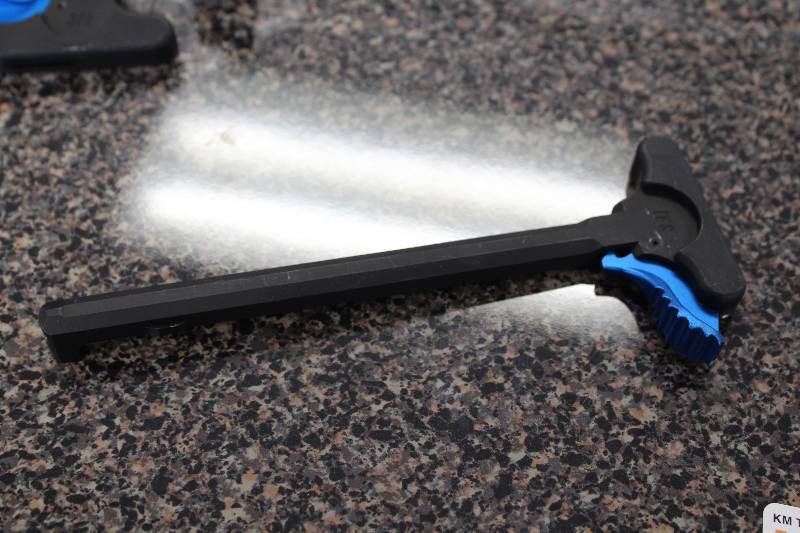 lot 2016 image: Black and Blue AR 15 Charging Handles