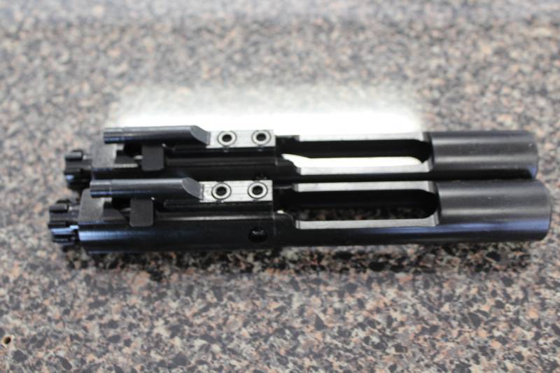 lot 2029 image: 2 Black Nitride Full Auto Bolt Carrier Groups