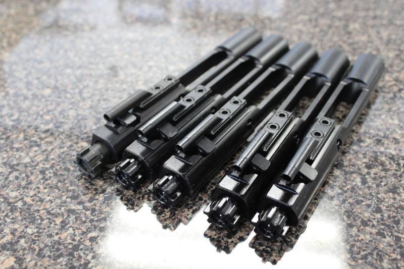 lot 2030 image: 5 Black Nitride Full Auto Bolt Carrier Groups