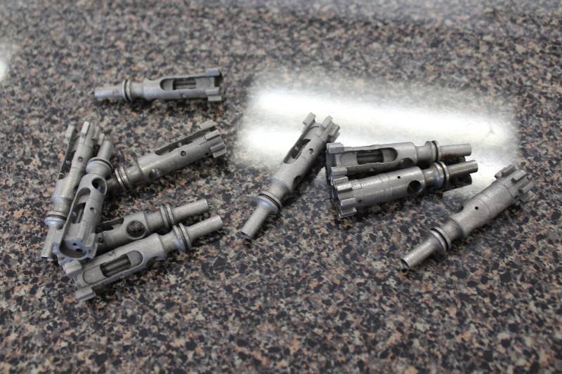 lot 2032 image: AR 15 bolts in the white