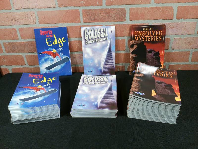 lot 21 image: AMP Reading System Library Sports On The Edge, Colossal Constructions, Great Unsolved Mysteries